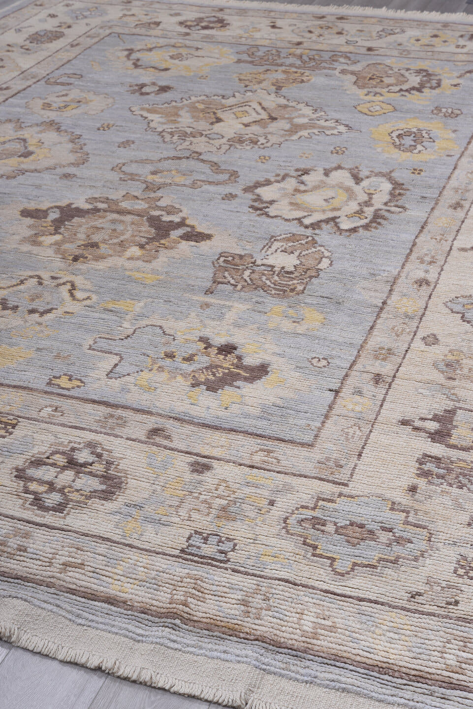 10' x 13' one-of-a-kind handmade vintage Tulu large size rug. Color palette: ivory, light blue, taupe, beige, pale gold