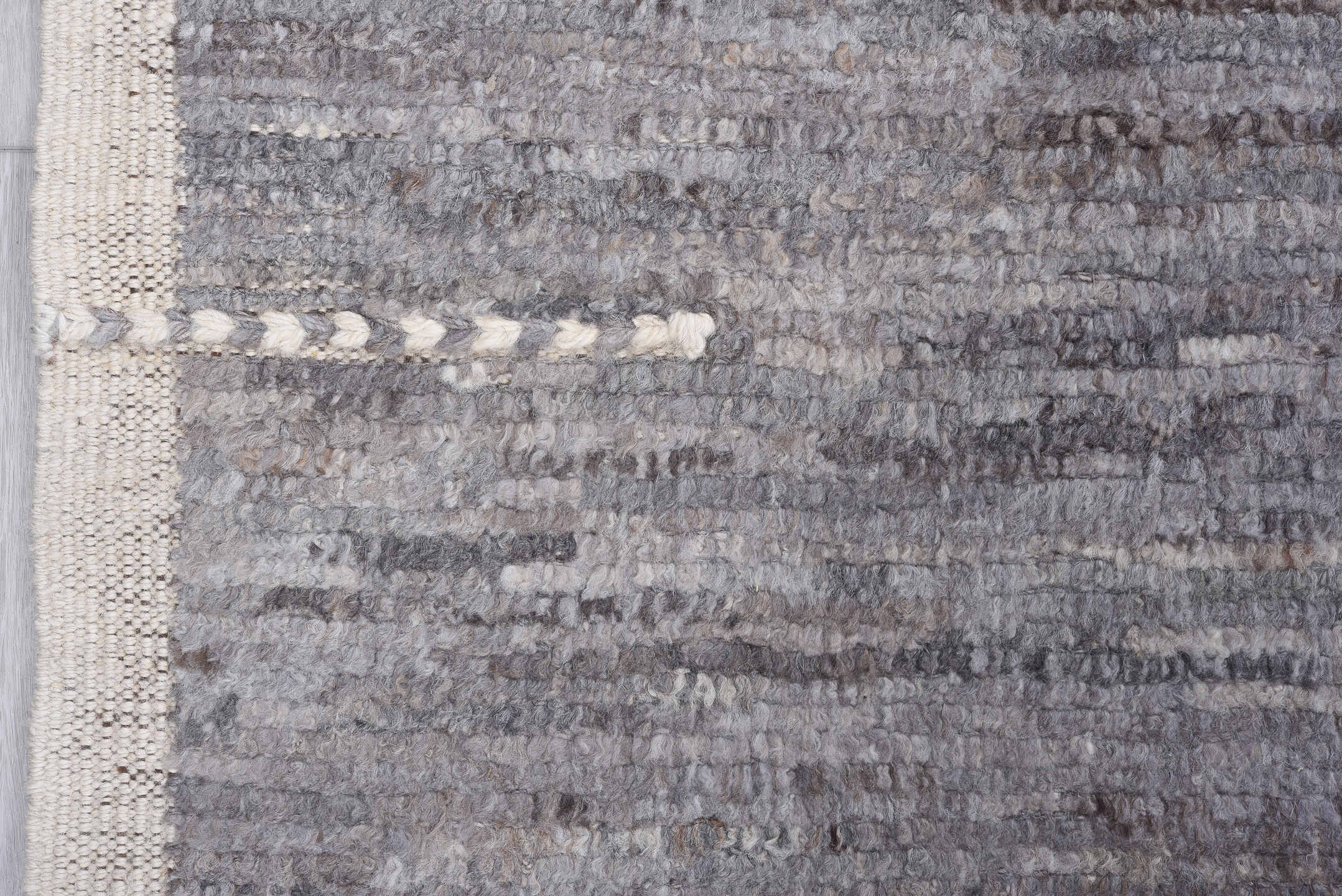 8' x 9' one-of-a-kind handmade vintage Tulu rug. Color palette: gray, ivory, taupe, charcoal, brown, beige, black