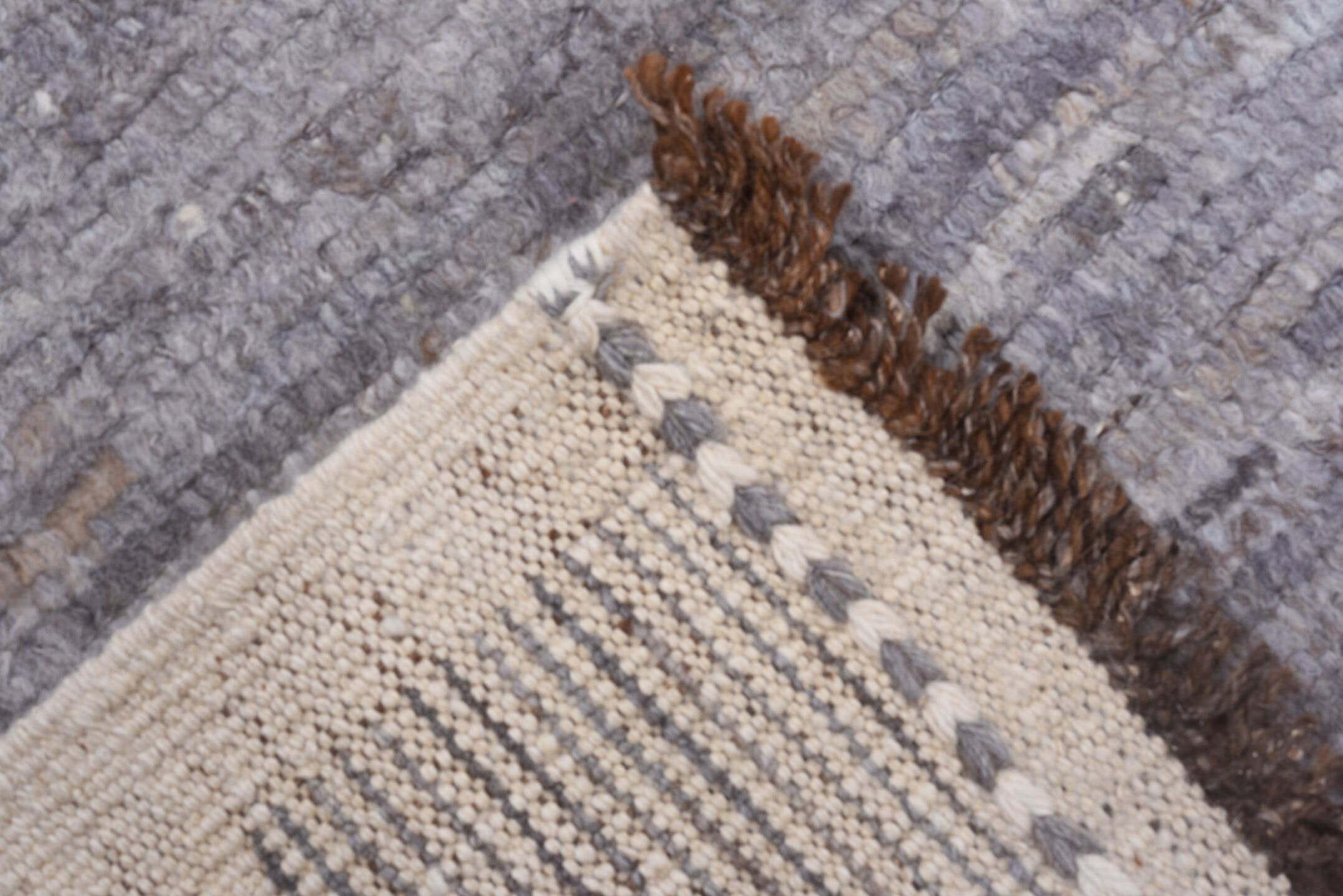 8' x 9' one-of-a-kind handmade vintage Tulu rug. Color palette: gray, ivory, taupe, charcoal, brown, beige, black