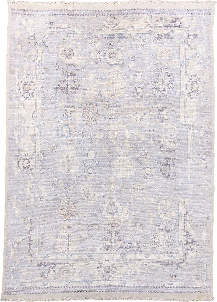 9' x 13' one-of-a-kind handmade vintage Tulu large size rug. Color palette: ivory, pale blue, lavender, cream, taupe