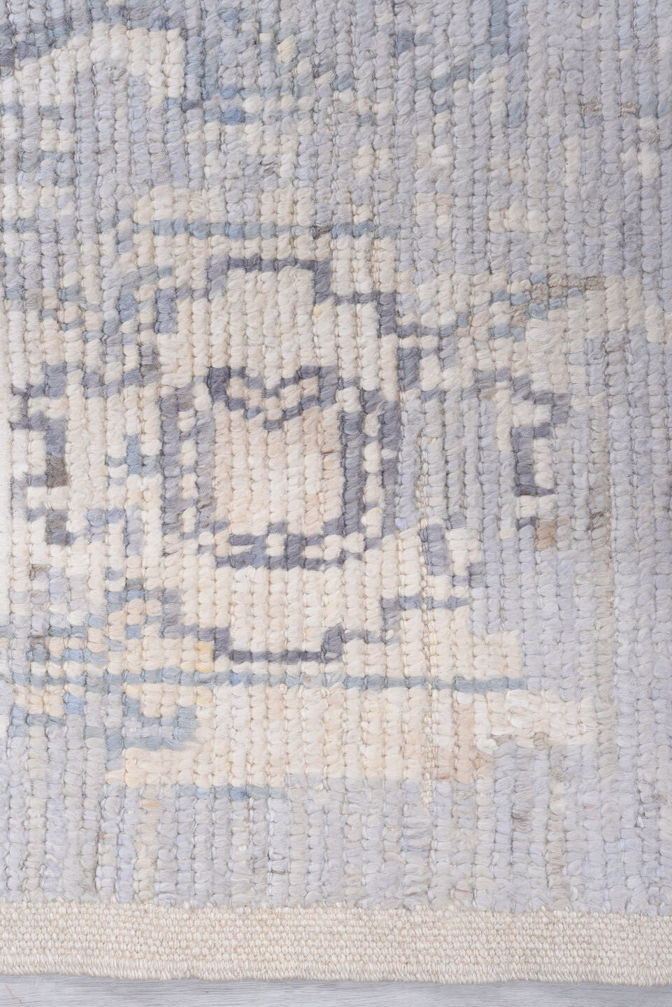 9' x 13' one-of-a-kind handmade vintage Tulu large size rug. Color palette: ivory, pale blue, lavender, cream, taupe