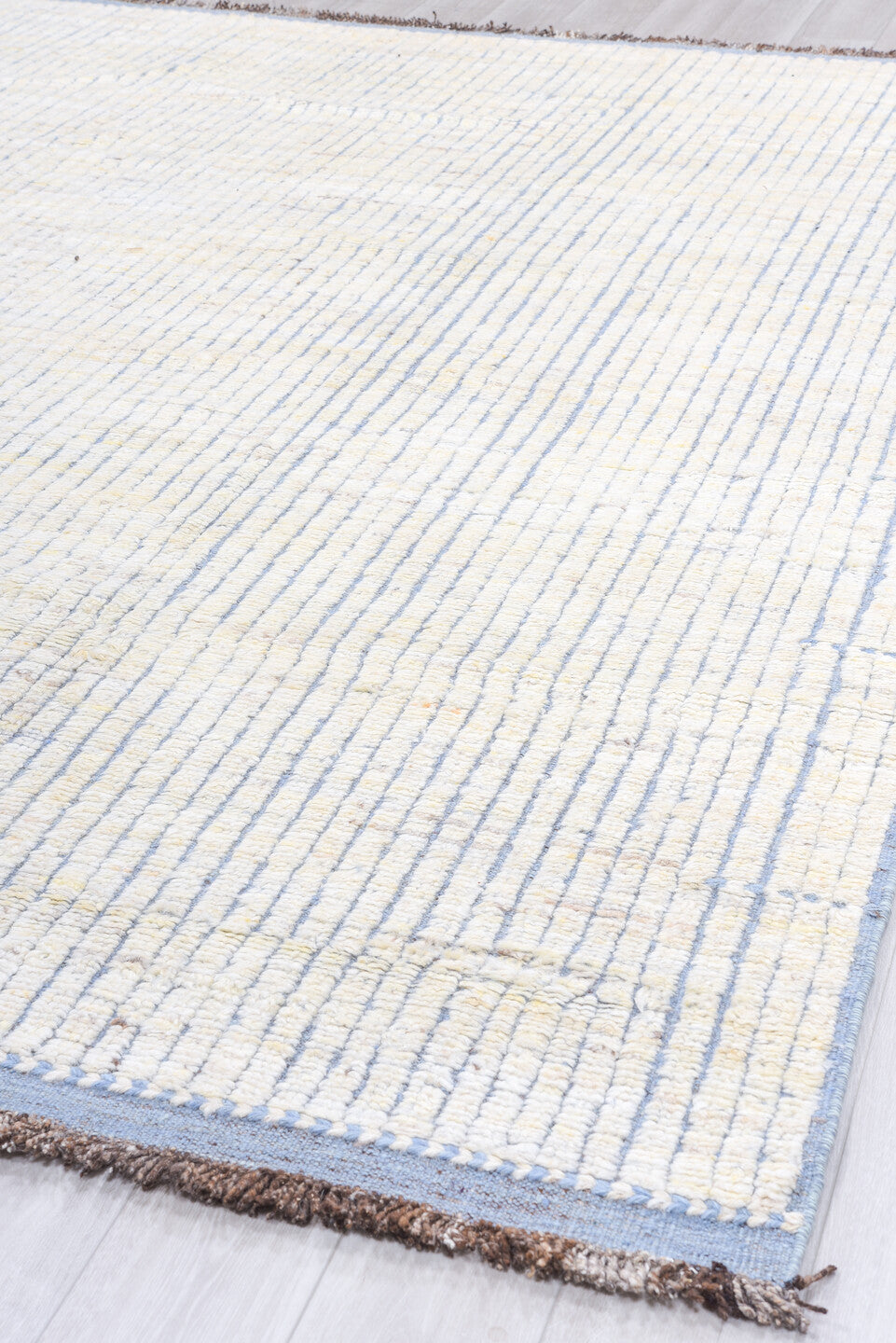 9' x 12' one-of-a-kind handmade vintage Tulu large size rug. Color palette: ivory, pale blue, brown, light blue