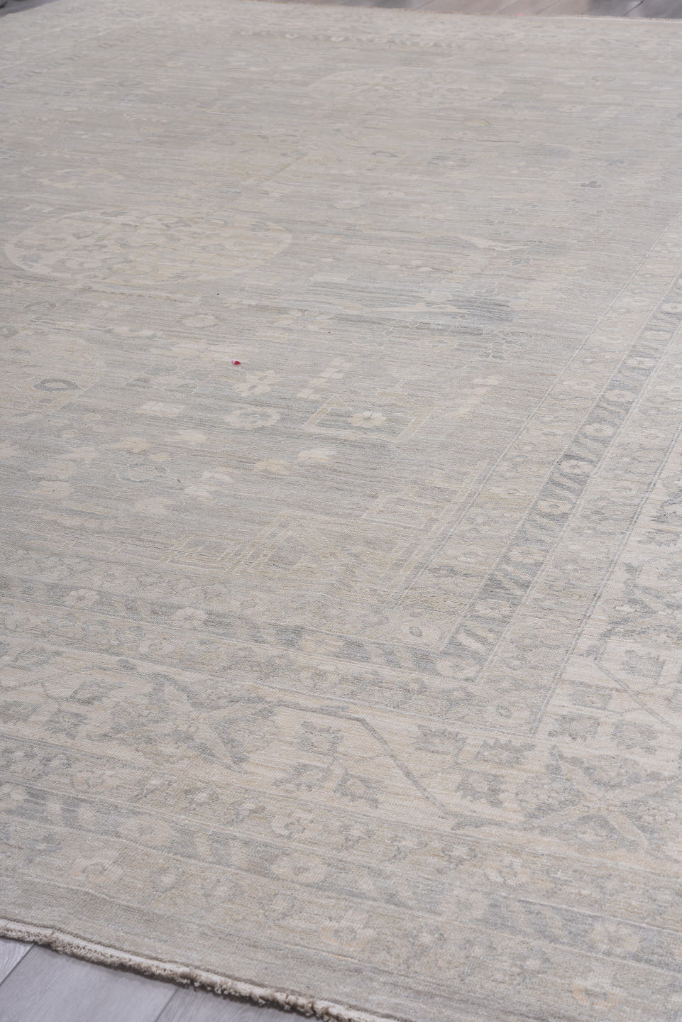 13' x 19' one-of-a-kind handmade vintage Khotan oversize rug. Color palette: ivory, taupe, beige, pale gray, sand, gray