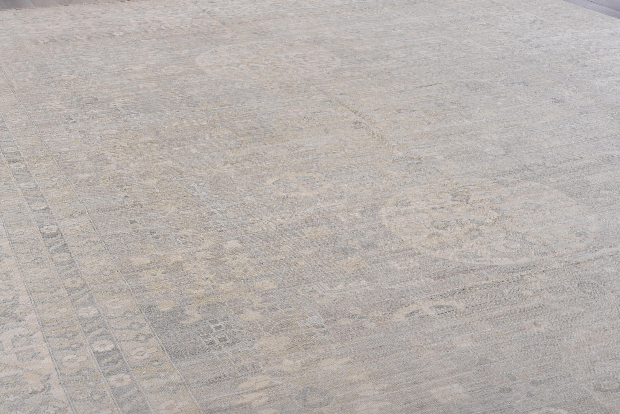 13' x 19' one-of-a-kind handmade vintage Khotan oversize rug. Color palette: ivory, taupe, beige, pale gray, sand, gray