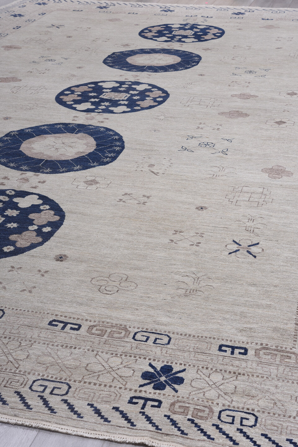 12' x 19' one-of-a-kind handmade vintage Khotan oversize rug. Color palette: blue, dim gray, fiord, gray, light blue