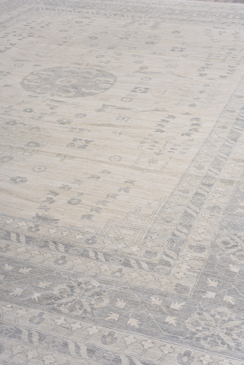 13' x 17' one-of-a-kind handmade vintage Khotan oversize rug. Color palette: dark gray, gainsboro, gray, light gray