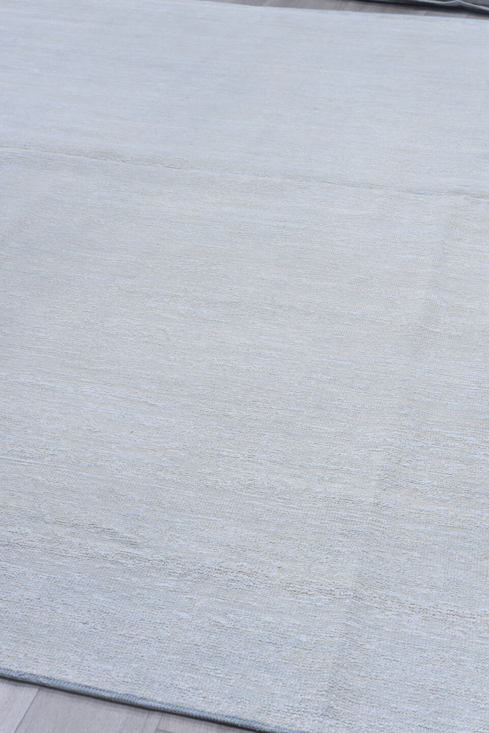 10' x 13' one-of-a-kind handmade vintage Sari Silk large size rug. Color palette: pale blue, silver, ivory, light blue, gray