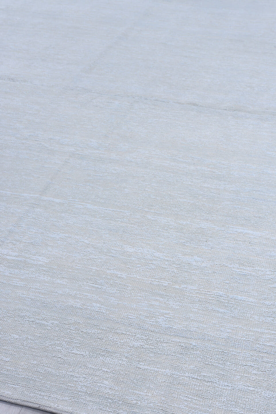 8' x 11' one-of-a-kind handmade vintage Sari Silk large size rug. Color palette: ice blue, silver, pale gray, ivory