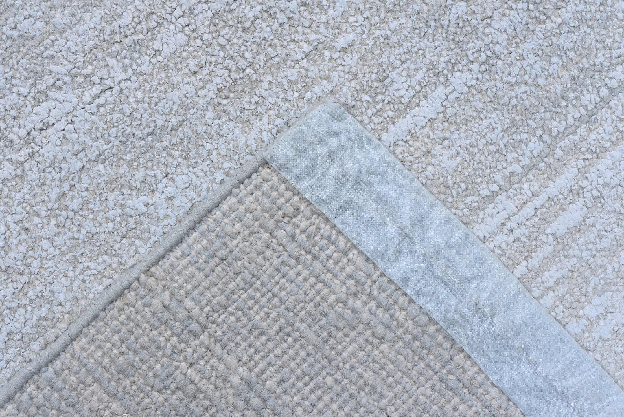 8' x 11' one-of-a-kind handmade vintage Sari Silk large size rug. Color palette: ice blue, silver, pale gray, ivory