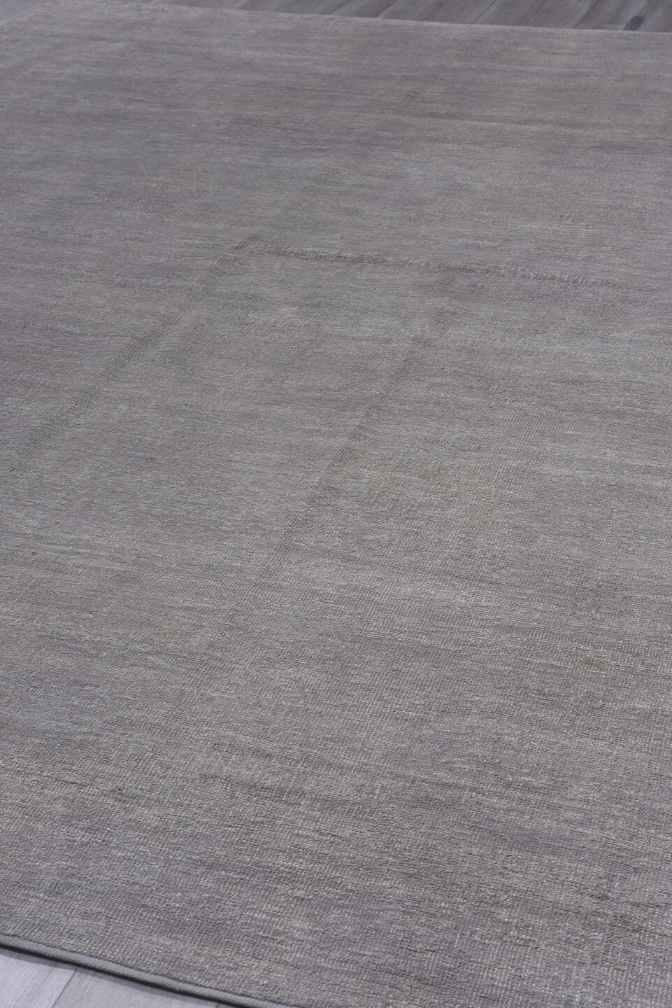 11' x 14' one-of-a-kind handmade vintage Plain oversize rug. Color palette: taupe, gray, greige, ivory, beige