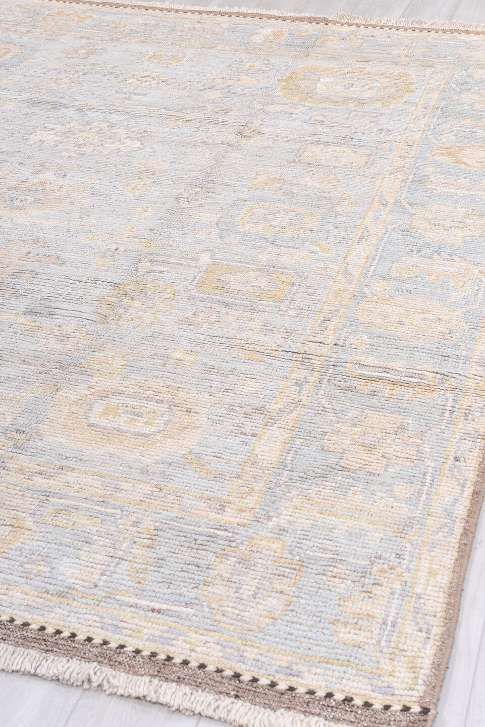 8' x 10' one-of-a-kind handmade vintage Oushak large size rug. Color palette: ivory, pale blue, beige, taupe, camel, brown