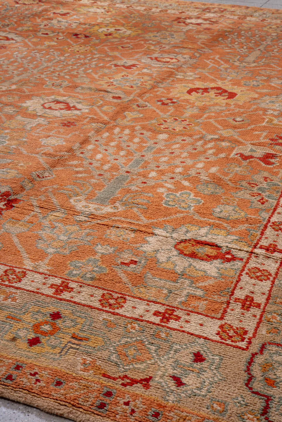 13' x 14' one-of-a-kind handmade antique Oushak oversize rug. Color palette: terra cotta, camel, ivory, sage, rust, gold