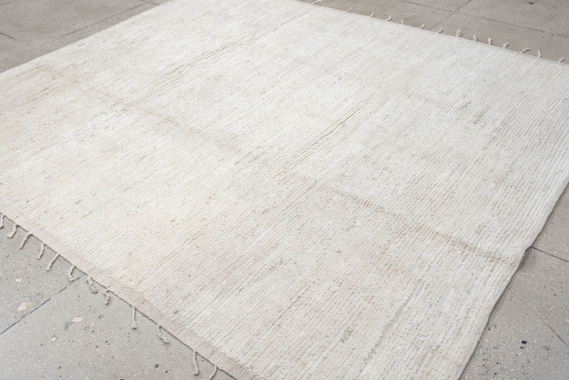 8' x 9' one-of-a-kind handmade vintage Tulu rug. Color palette: ivory, cream, beige, taupe, gray