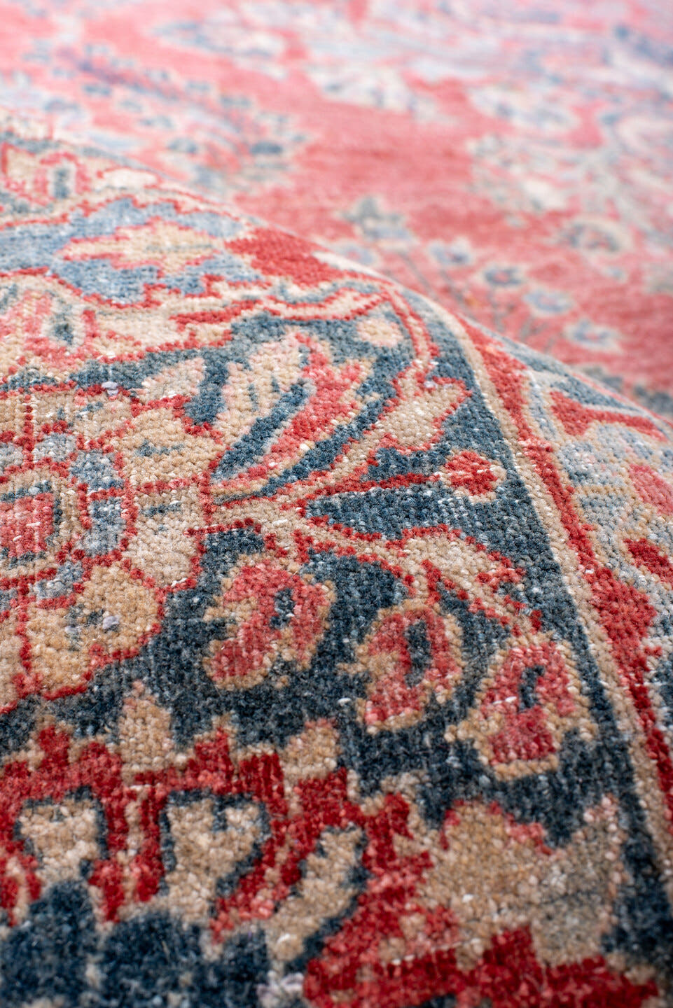 13' x 10' one-of-a-kind handmade vintage  rug. Color palette: coral, blue, ivory, rose, slate, crimson, terracotta, pink