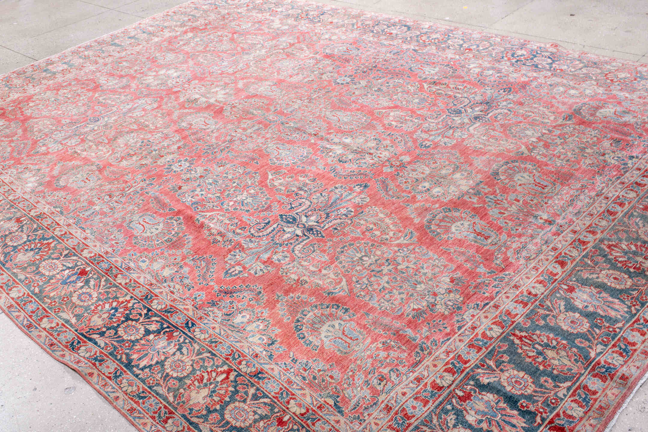 13' x 10' one-of-a-kind handmade vintage  rug. Color palette: coral, blue, ivory, rose, slate, crimson, terracotta, pink