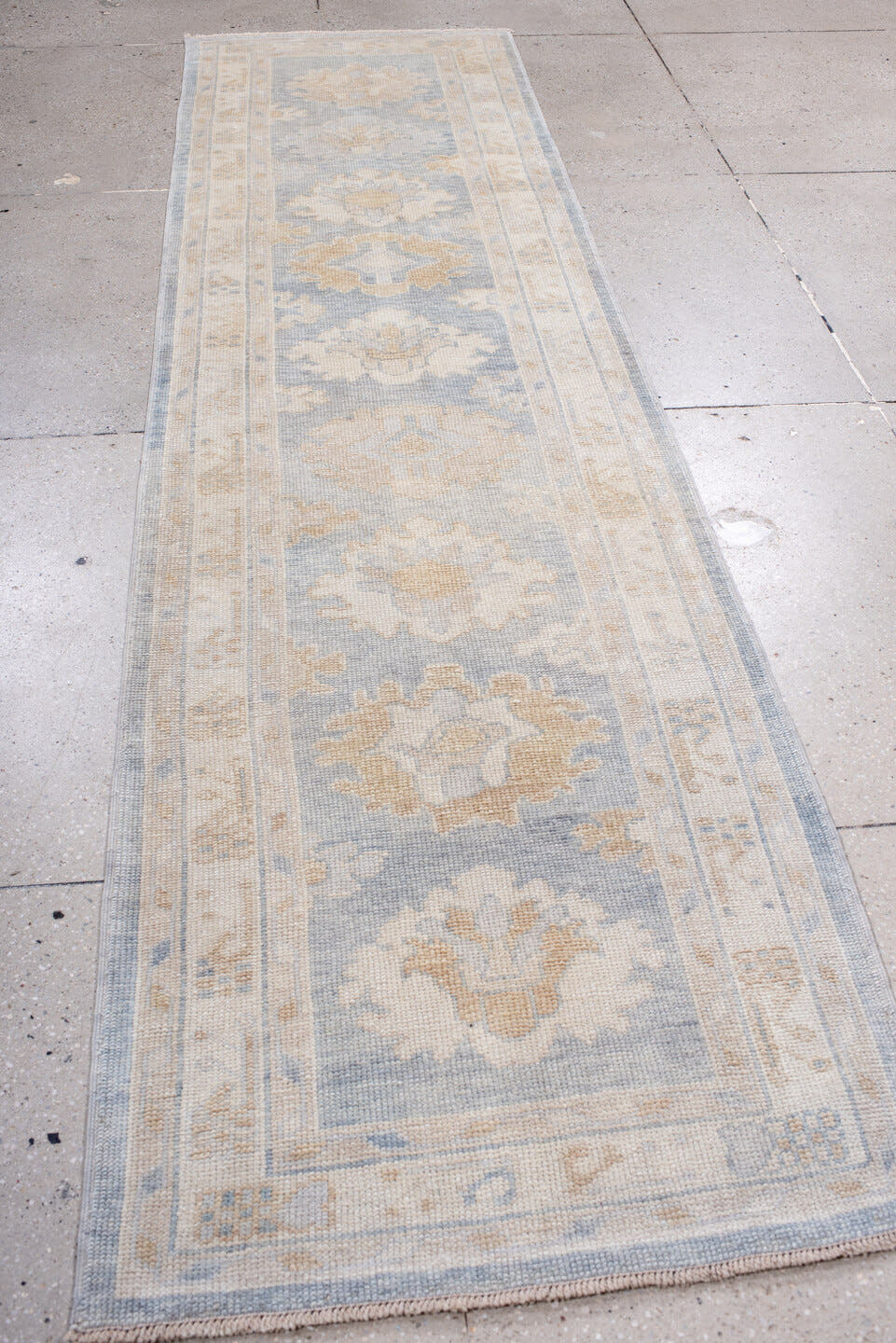3' x 11' one-of-a-kind handmade vintage Oushak runner rug. Color palette: ivory, pale blue, cream, beige, taupe, light blue