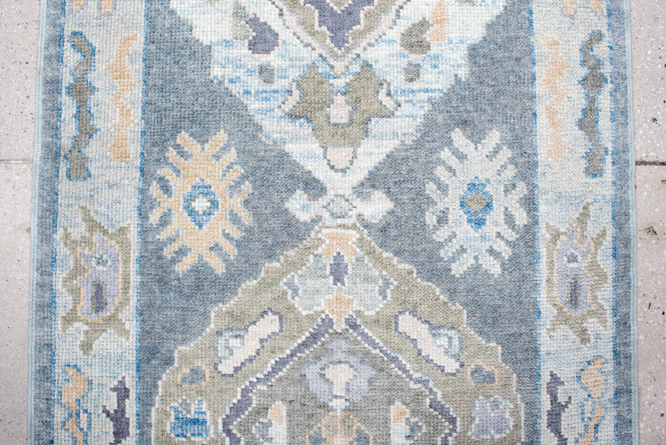 2' x 9' one-of-a-kind handmade vintage Oushak runner rug. Color palette: blue, ivory, sage, taupe, pale_gold, slate, green