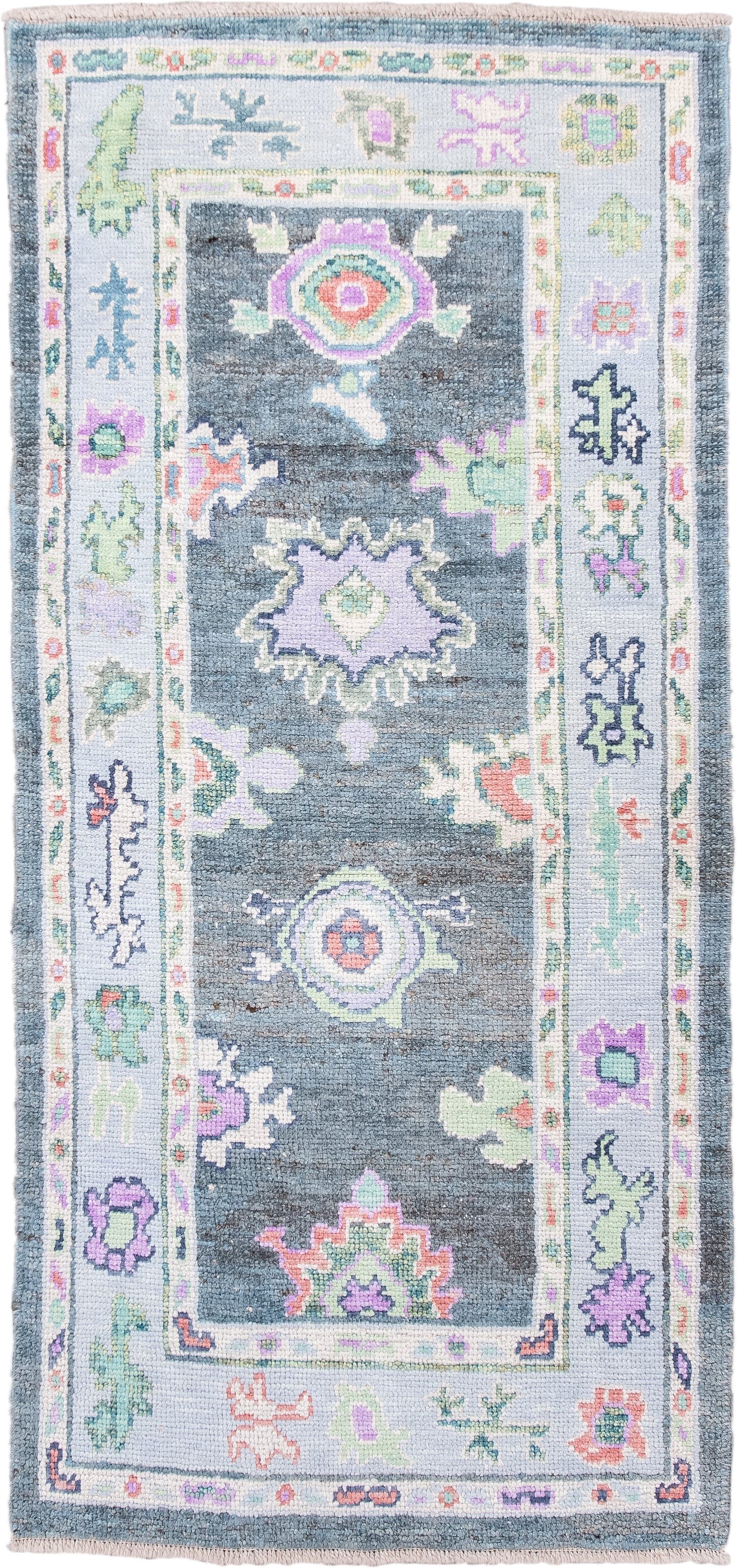 3' x 6' one-of-a-kind handmade vintage Oushak runner rug. Color palette: charcoal, ivory, lavender, sage, soft blue, coral