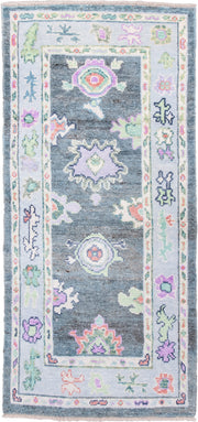 3' x 6' one-of-a-kind handmade vintage Oushak runner rug. Color palette: charcoal, ivory, lavender, sage, soft blue, coral