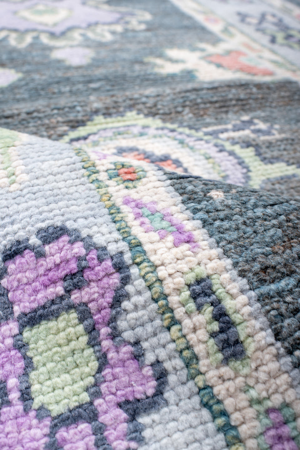 3' x 6' one-of-a-kind handmade vintage Oushak runner rug. Color palette: charcoal, ivory, lavender, sage, soft blue, coral
