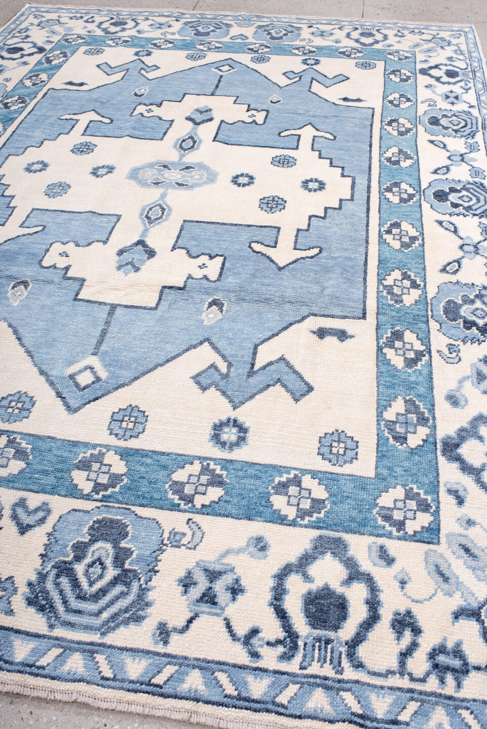 8' x 11' one-of-a-kind handmade vintage Oushak large size rug. Color palette: ivory, sky blue, slate blue, powder blue