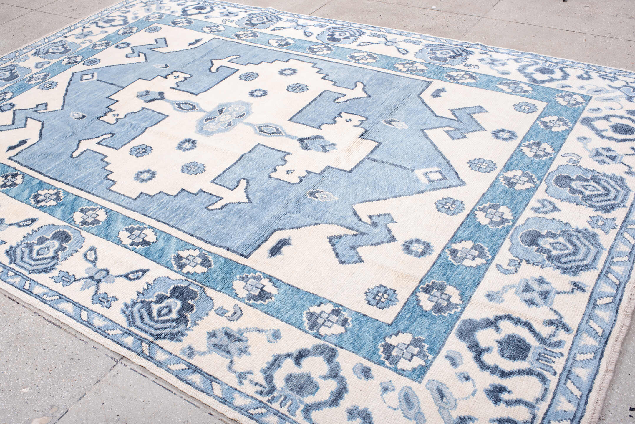 8' x 11' one-of-a-kind handmade vintage Oushak large size rug. Color palette: ivory, sky blue, slate blue, powder blue