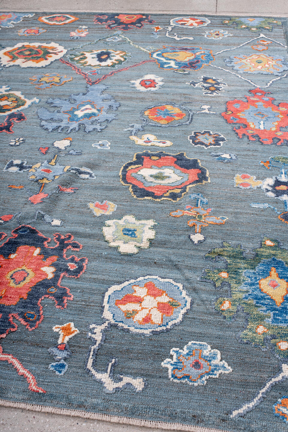 8' x 10' one-of-a-kind handmade vintage Oushak large size rug. Color palette: blue-gray, ivory, coral, slate, gold, navy