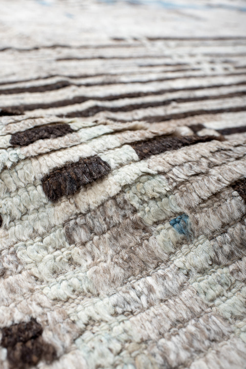 8' x 12' one-of-a-kind handmade vintage Tulu large size rug. Color palette: ivory, charcoal, sky blue, taupe, cream, gray
