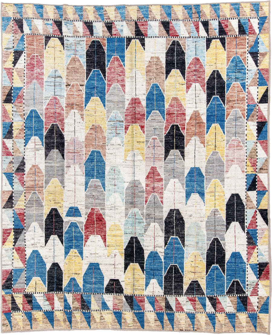 9' x 11' one-of-a-kind handmade vintage Tulu large size rug. Color palette: ivory, blue, charcoal, yellow, rose, taupe
