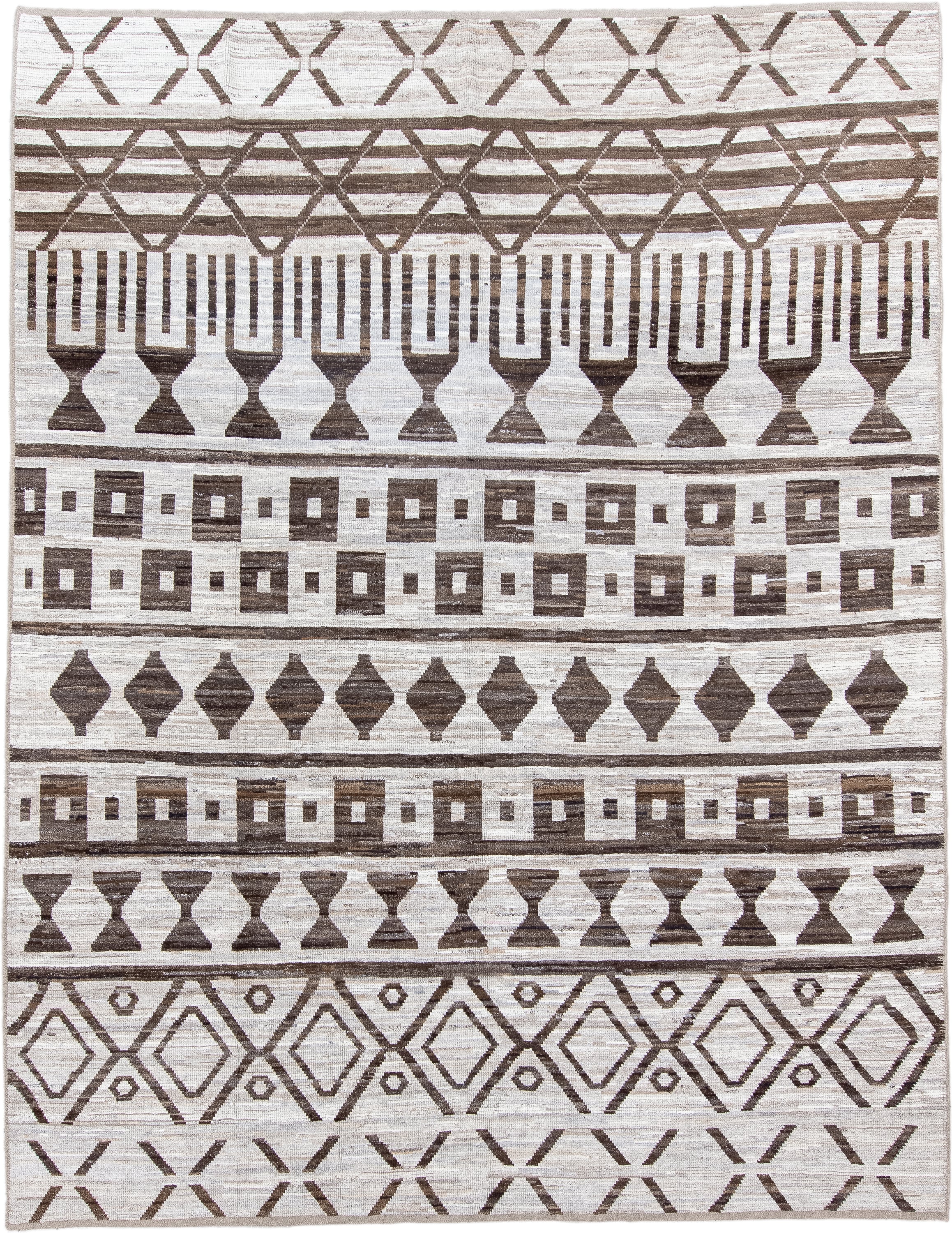 9' x 12' one-of-a-kind handmade vintage Tulu large size rug. Color palette: ivory, brown, taupe, beige, gray
