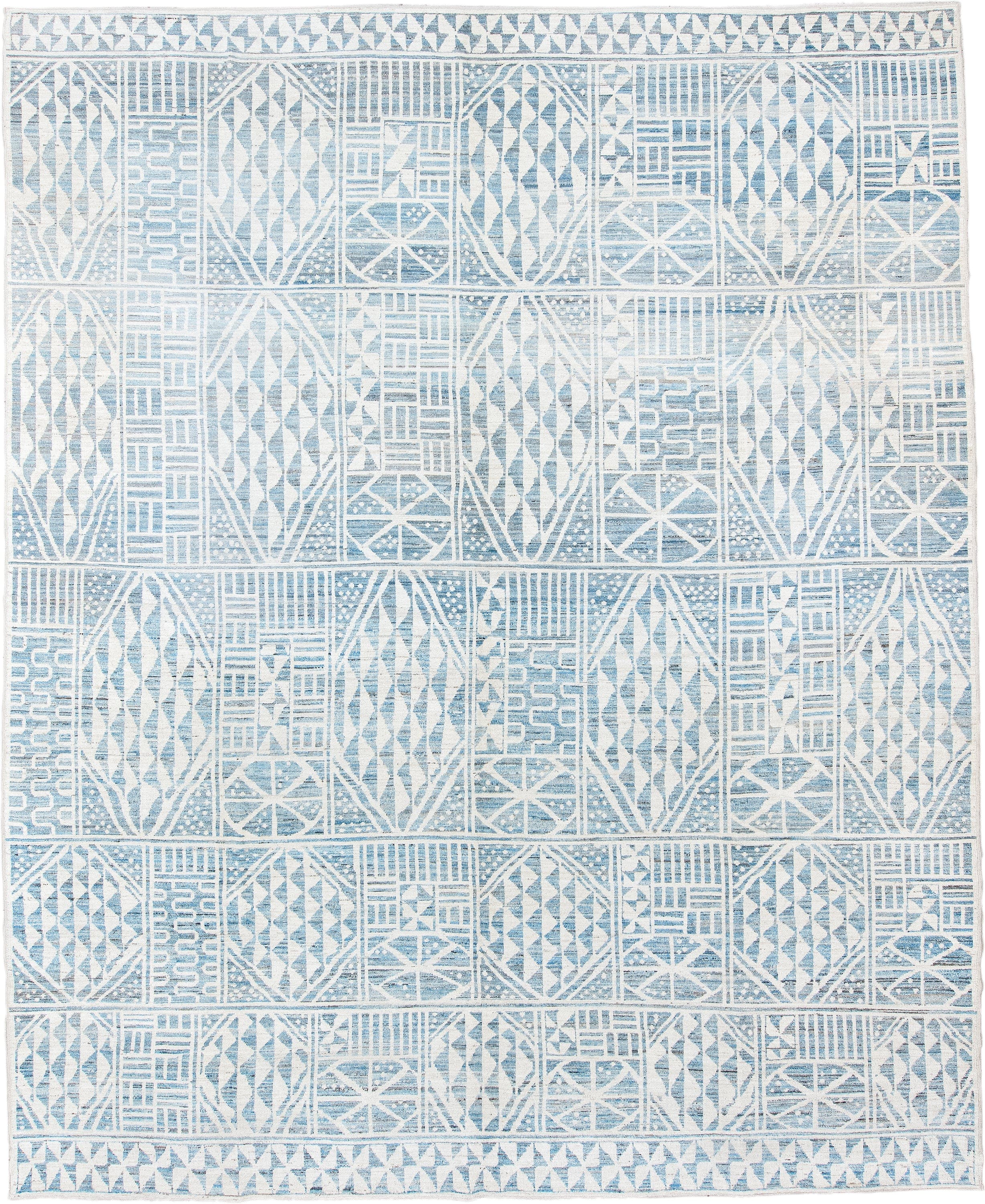 12' x 14' one-of-a-kind handmade vintage Tulu oversize rug. Color palette: ivory, sky blue, powder blue, light blue