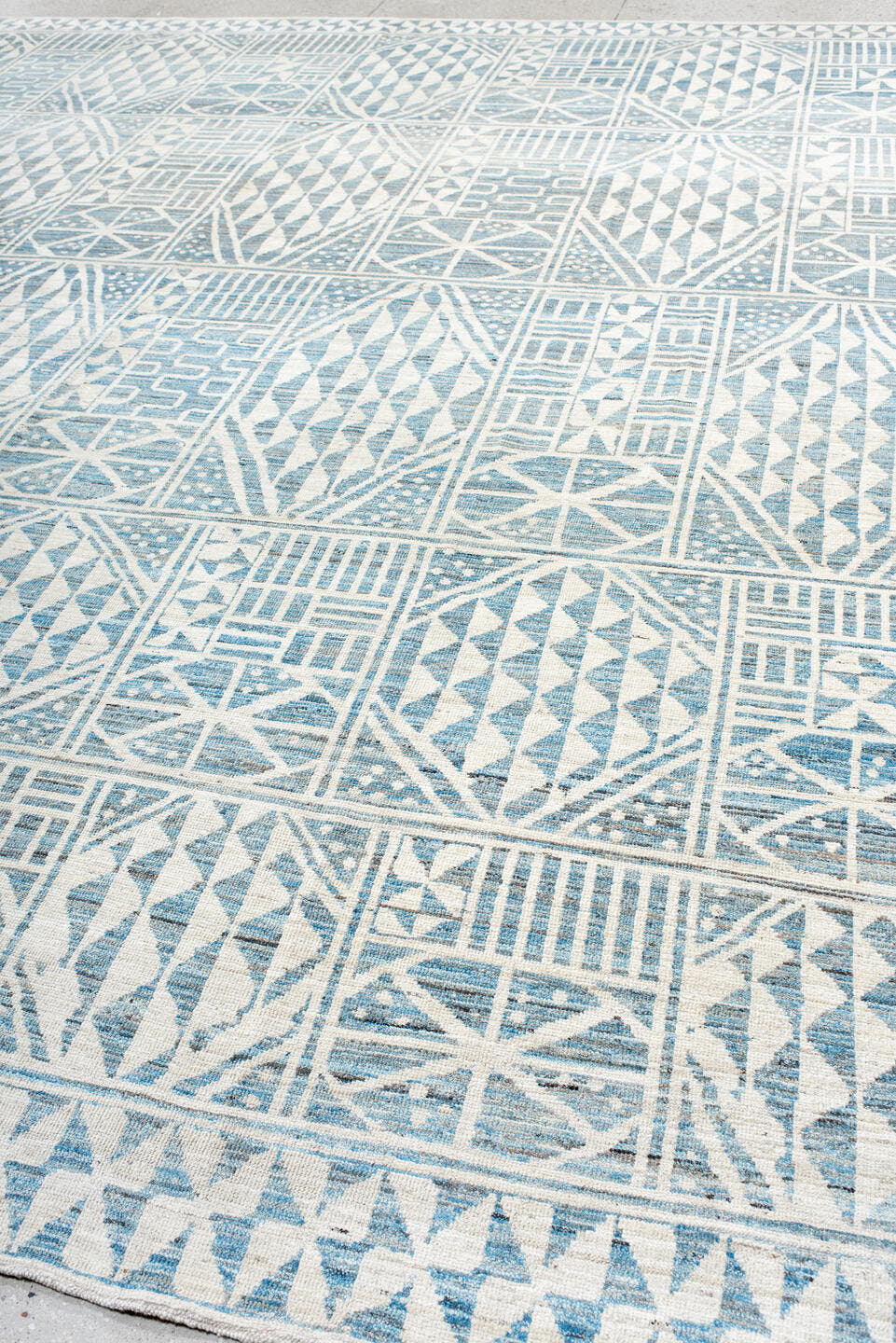 12' x 14' one-of-a-kind handmade vintage Tulu oversize rug. Color palette: ivory, sky blue, powder blue, light blue