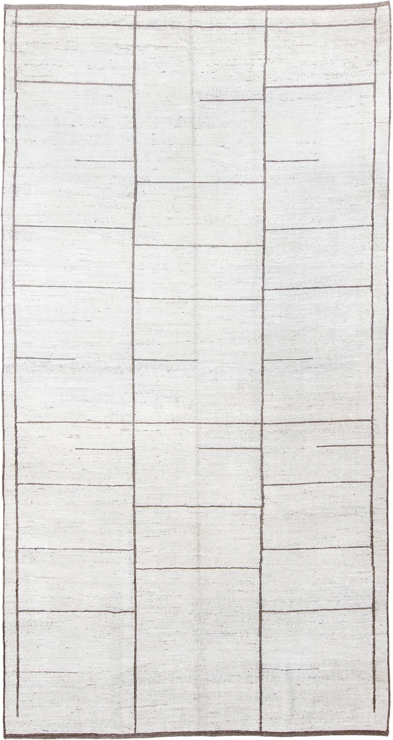 7' x 13' one-of-a-kind handmade vintage Tulu large size rug. Color palette: ivory, taupe, brown, cream, beige, gray