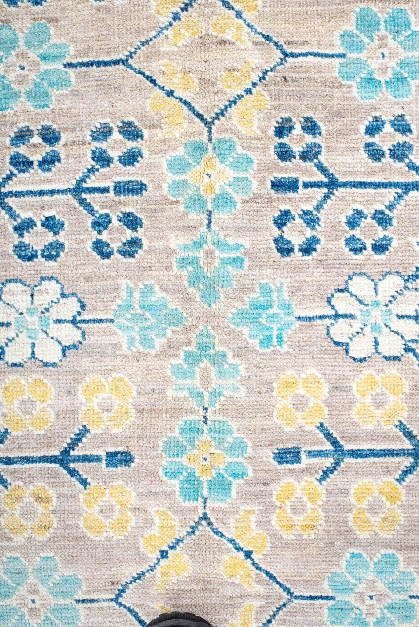 9' x 12' one-of-a-kind handmade vintage Khotan large size rug. Color palette: ivory, sky_blue, navy, pale_gold, taupe, cream