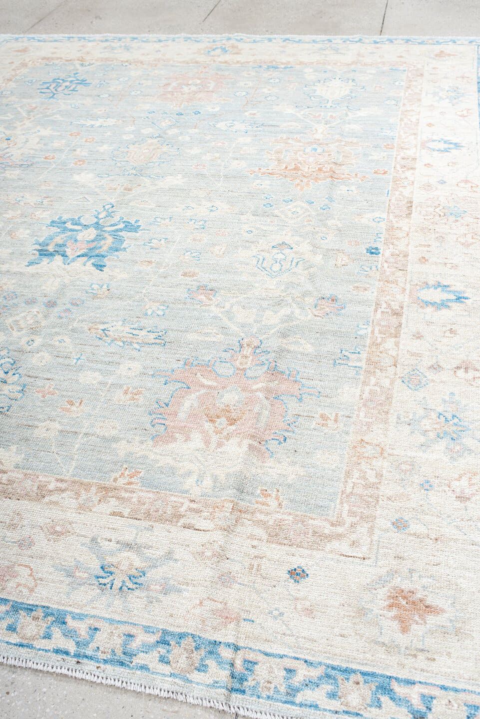8' x 10' one-of-a-kind handmade vintage Oushak large size rug. Color palette: ivory, pale blue, blush, cream, sky blue