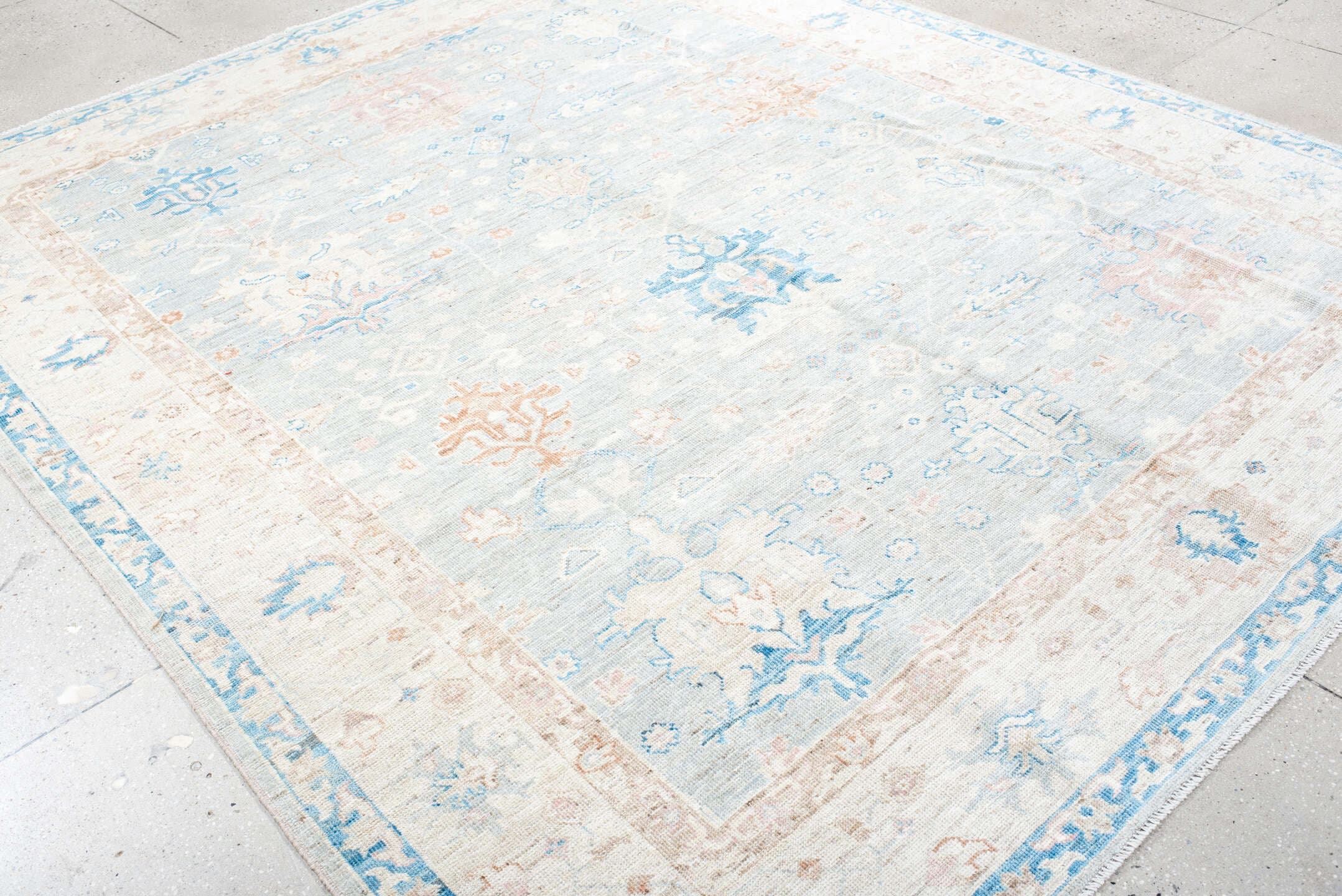 8' x 10' one-of-a-kind handmade vintage Oushak large size rug. Color palette: ivory, pale blue, blush, cream, sky blue