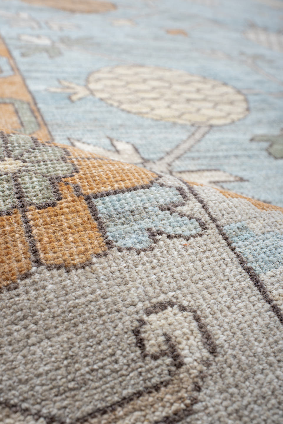 13' x 19' one-of-a-kind handmade vintage Khotan oversize rug. Color palette: pale blue, ivory, peach, taupe, sage, camel