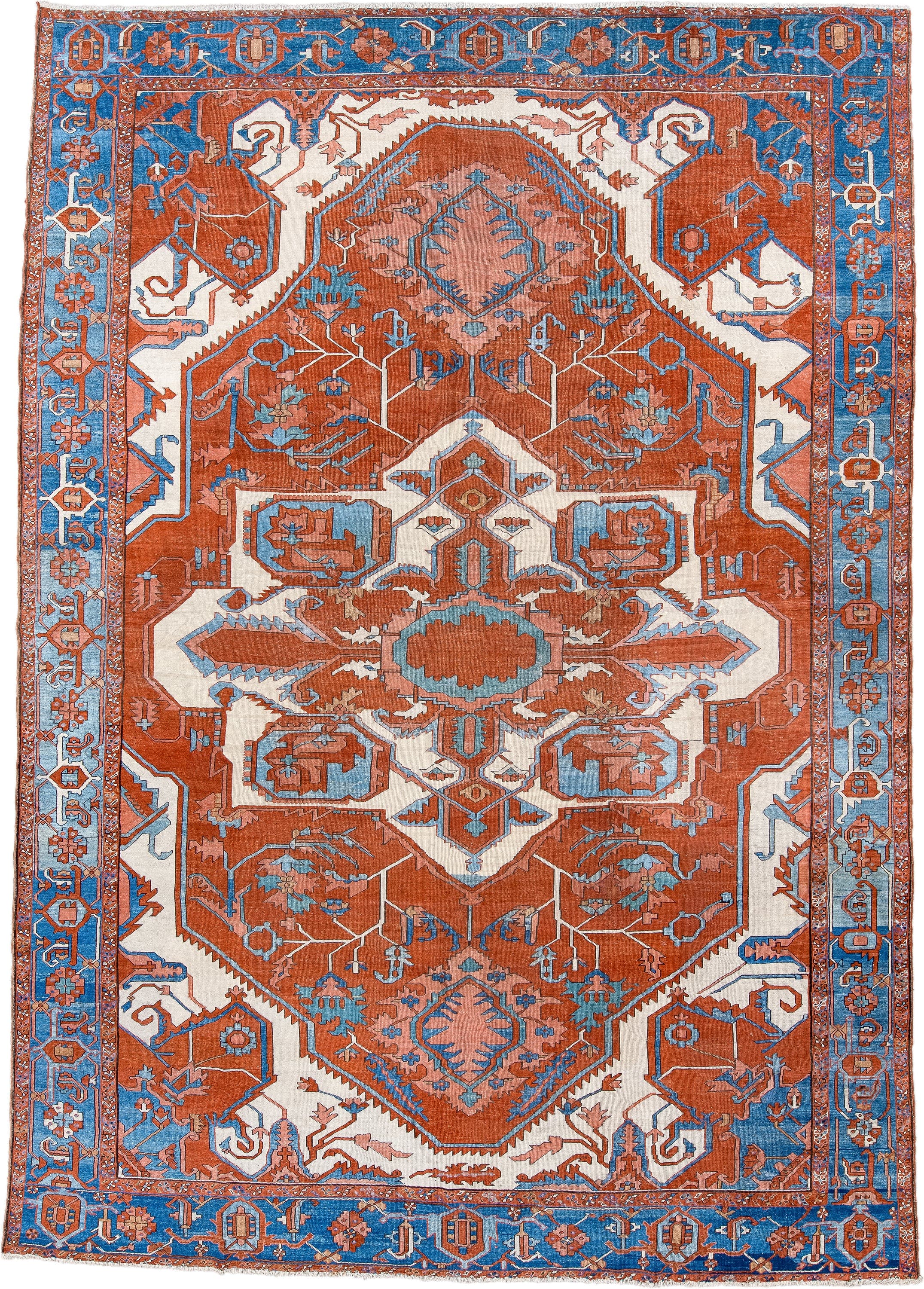 10' x 15' one-of-a-kind handmade vintage Serapi rug. Color palette: terra cotta, sky blue, ivory, rose, rust, camel