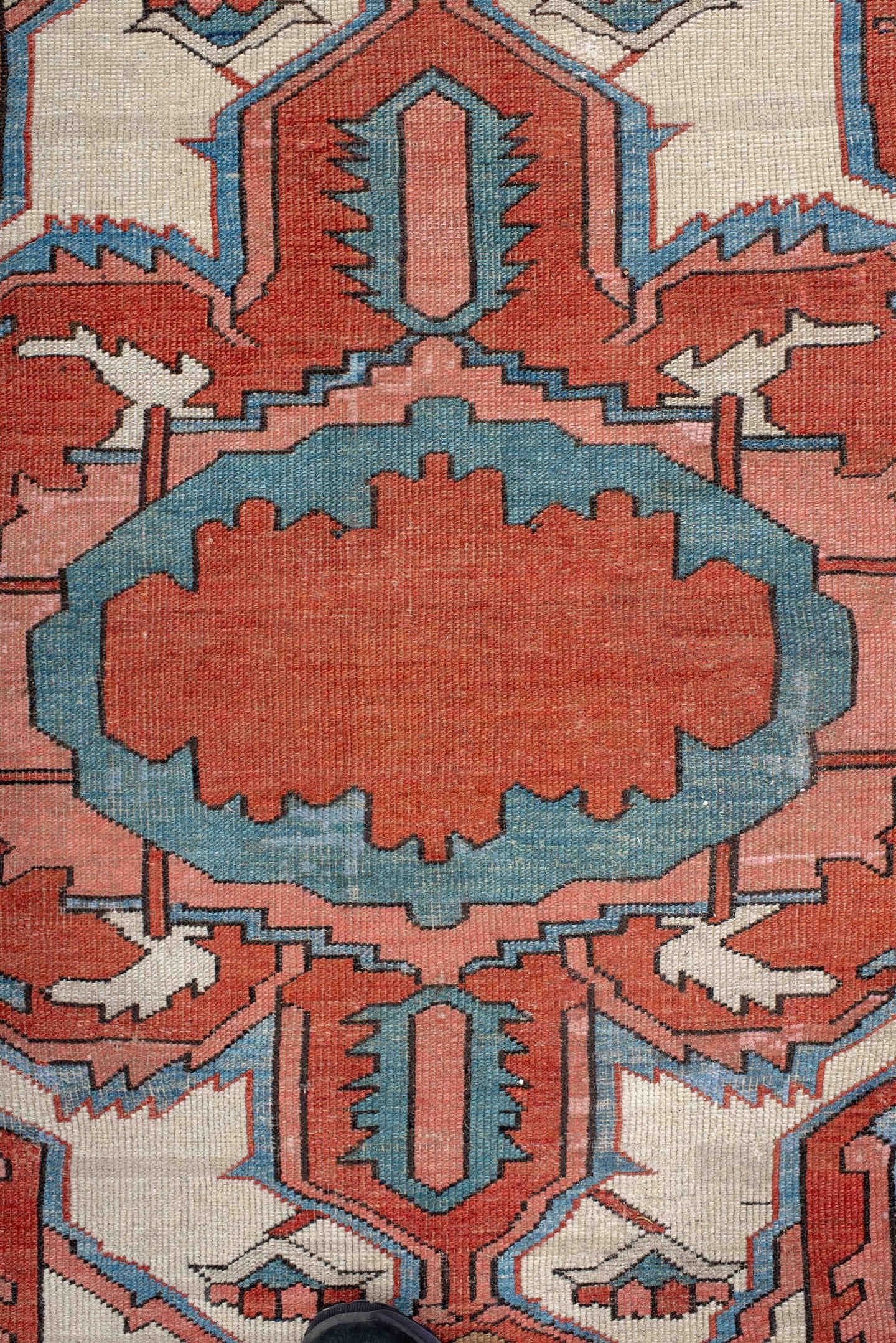 10' x 15' one-of-a-kind handmade vintage Serapi rug. Color palette: terra cotta, sky blue, ivory, rose, rust, camel