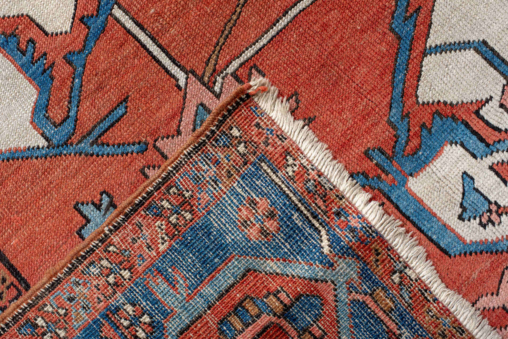 10' x 15' one-of-a-kind handmade vintage Serapi rug. Color palette: terra cotta, sky blue, ivory, rose, rust, camel
