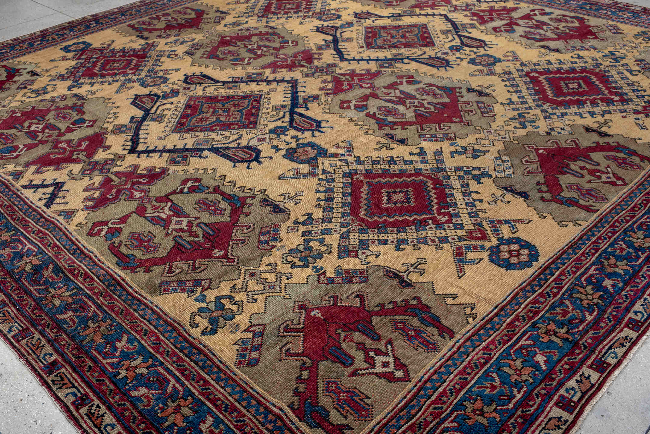 14' x 14' one-of-a-kind handmade vintage Oushak oversize rug. Color palette: ivory, blue, burgundy, taupe, rust, navy, beige