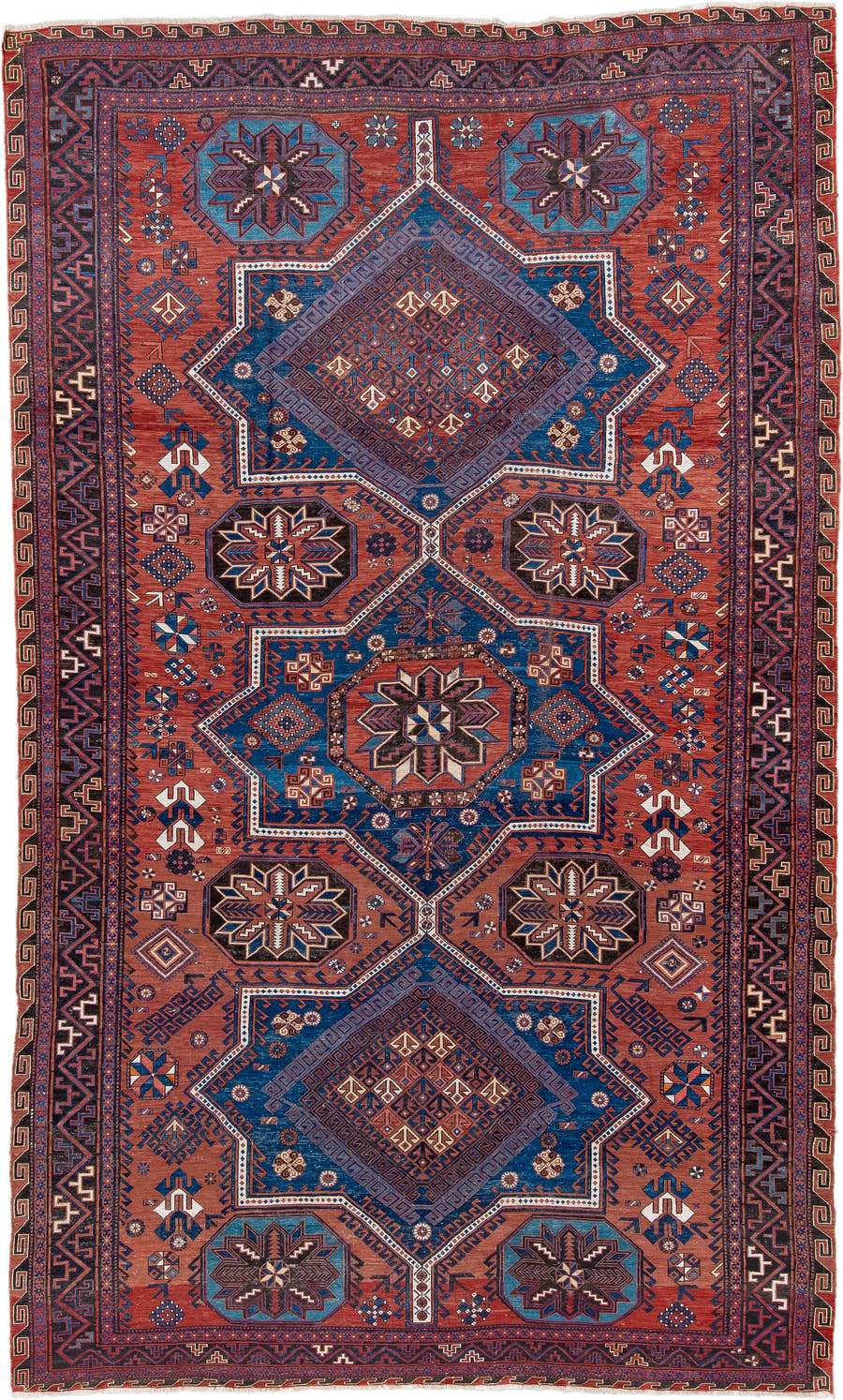 7' x 12' one-of-a-kind handmade vintage Sumak large size rug. Color palette: rust, indigo, navy, ivory, burgundy, teal