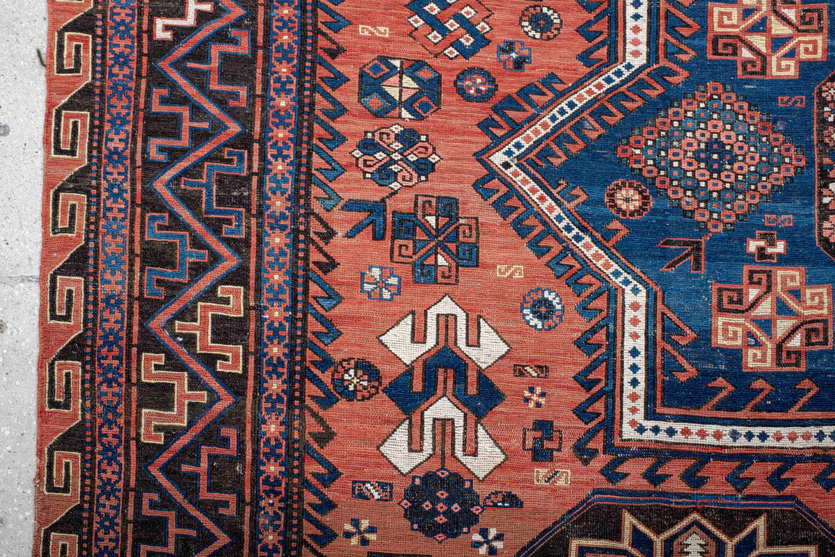 7' x 12' one-of-a-kind handmade vintage Sumak large size rug. Color palette: rust, indigo, navy, ivory, burgundy, teal