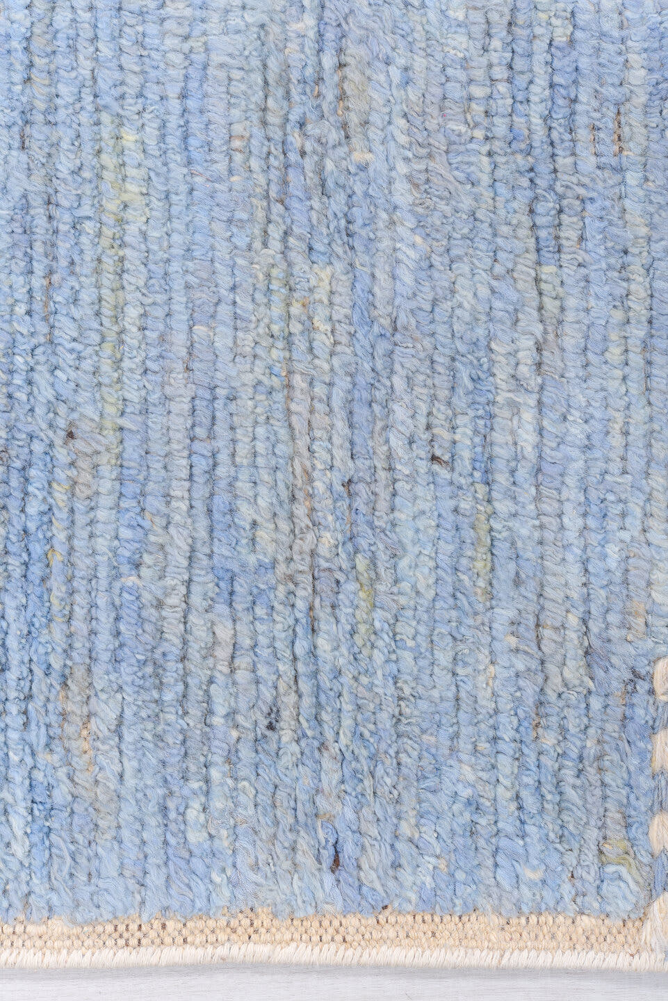 8' x 9' one-of-a-kind handmade vintage Tulu rug. Color palette: pale blue, ivory, charcoal, sky blue, light blue, gray