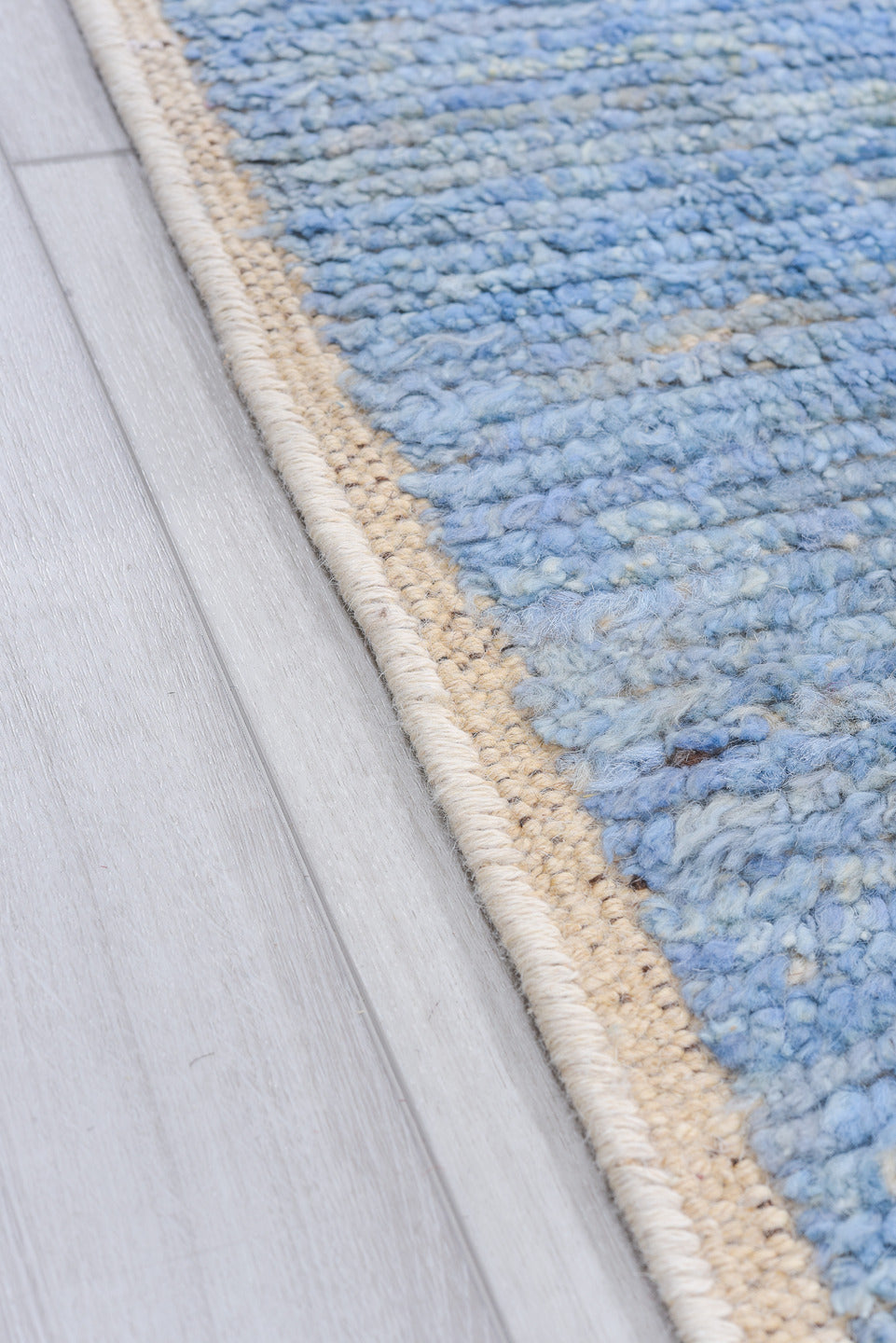 8' x 9' one-of-a-kind handmade vintage Tulu rug. Color palette: pale blue, ivory, charcoal, sky blue, light blue, gray