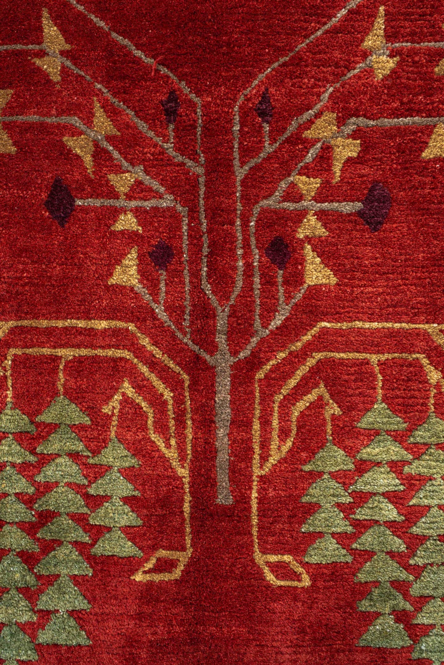 9' x 13' one-of-a-kind handmade vintage Donegal large size rug. Color palette: rust, navy, ivory, sage, peach, burgundy