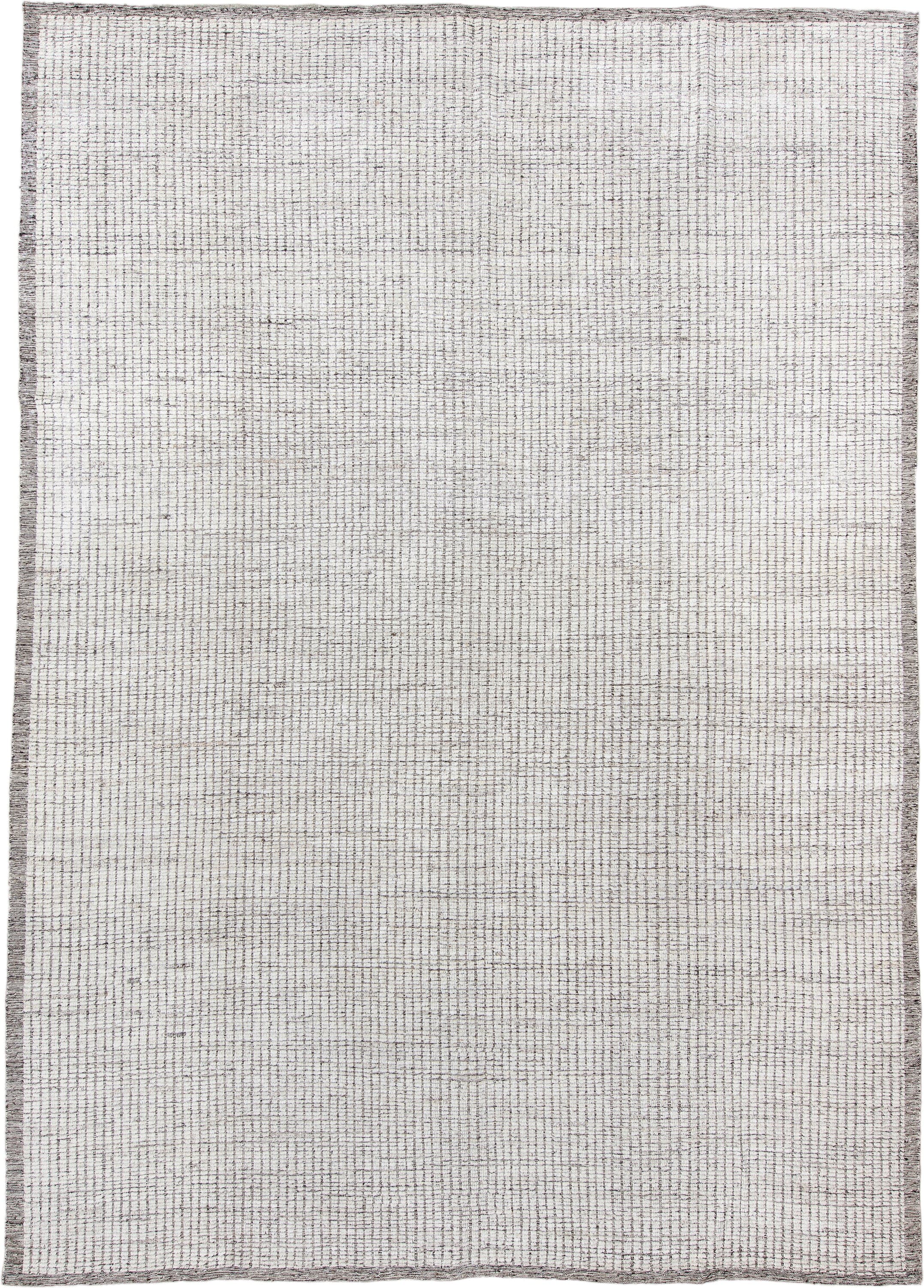 10' x 14' one-of-a-kind handmade vintage Tulu large size rug. Color palette: ivory, charcoal, taupe, cream, gray, black