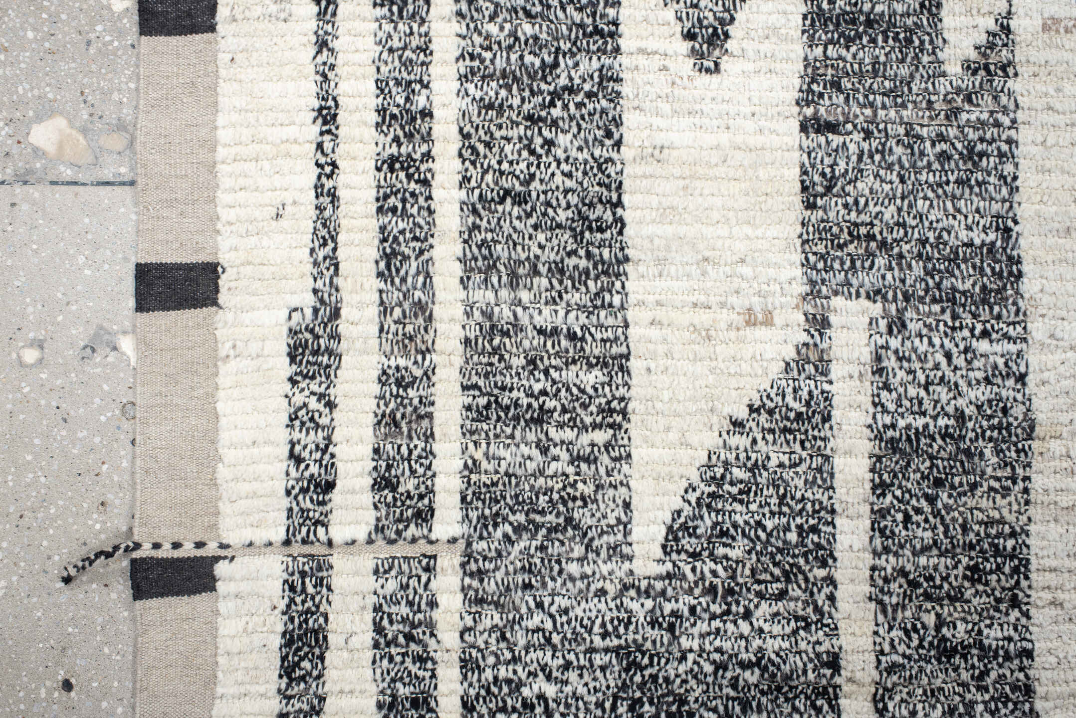 8' x 11' one-of-a-kind handmade vintage Tulu large size rug. Color palette: ivory, charcoal, taupe, black, gray, beige