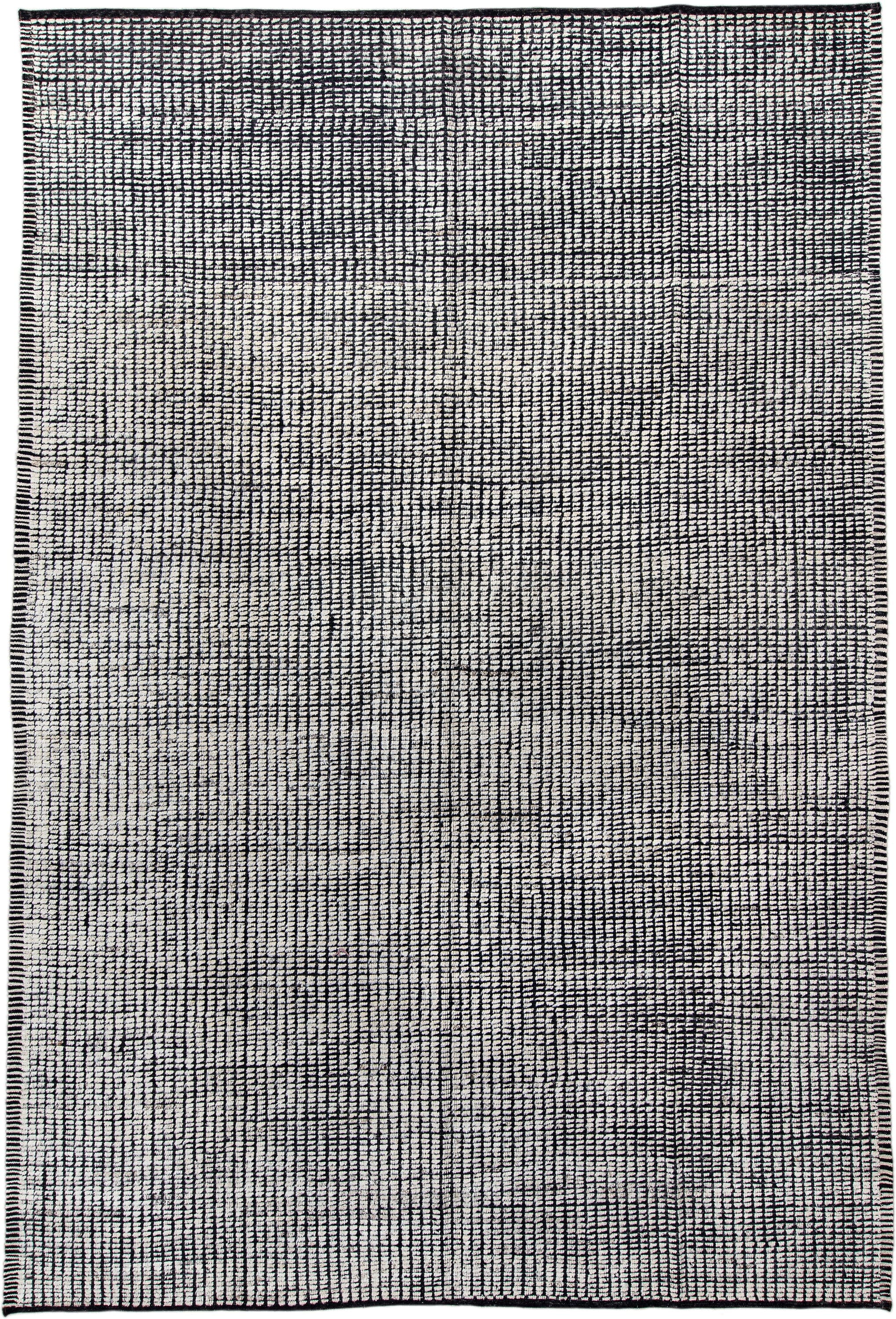 9' x 13' one-of-a-kind handmade vintage Tulu large size rug. Color palette: ivory, charcoal, gray, black