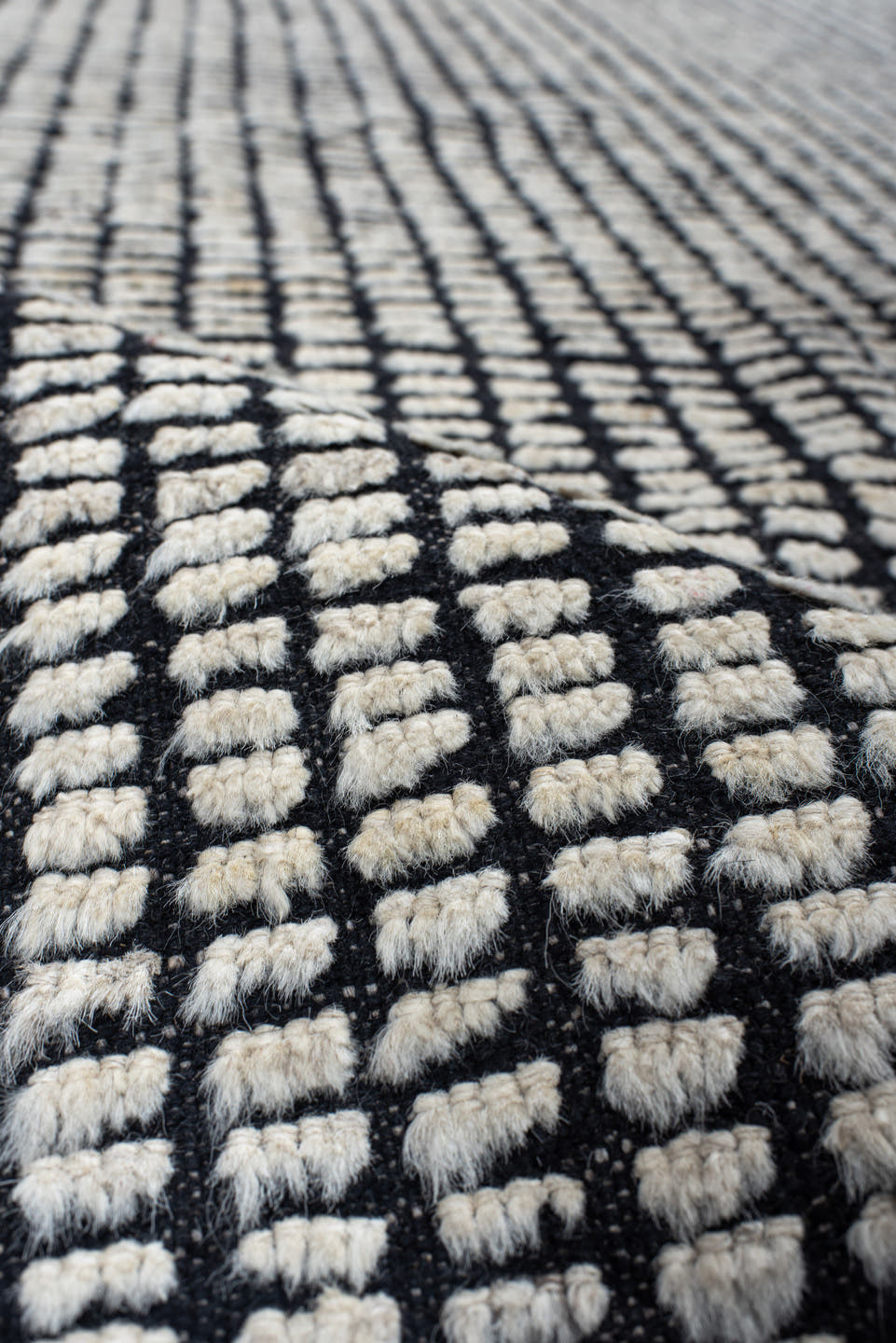 9' x 13' one-of-a-kind handmade vintage Tulu large size rug. Color palette: ivory, charcoal, gray, black